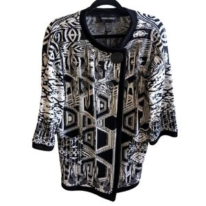 Frank Lyman sweater. Black  and white geometric pattern. Size 8.